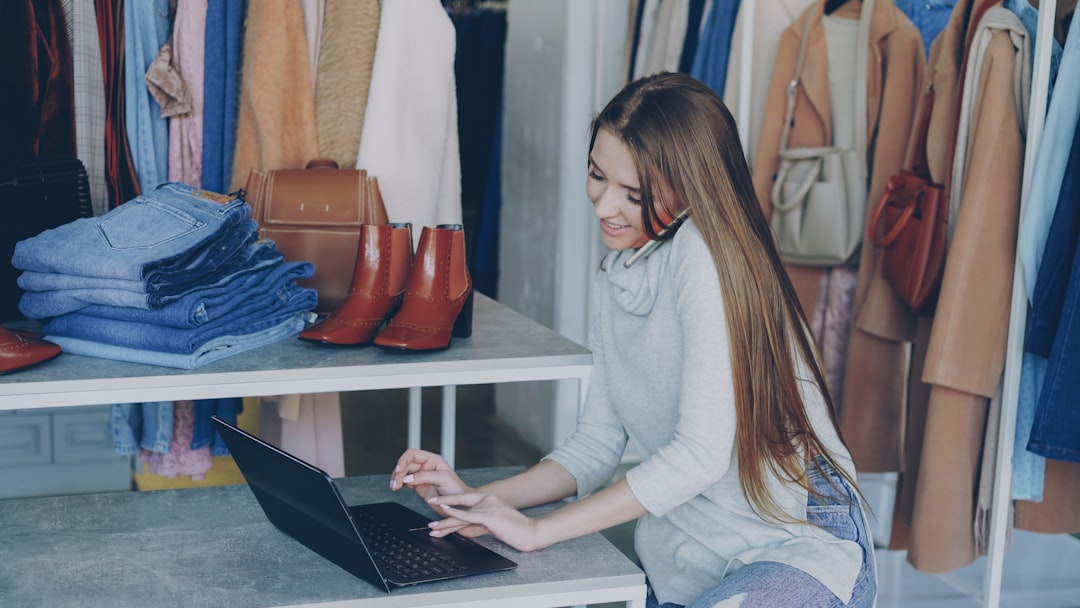 Small business owner comparing CDN providers online