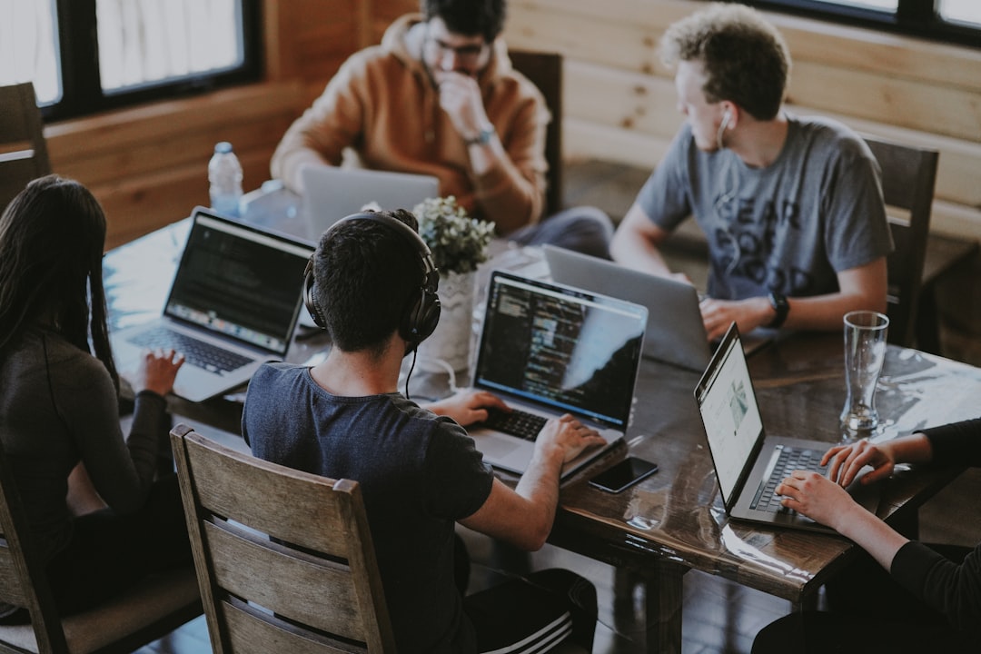 Small team reviewing chat logs to set human handoff triggers
