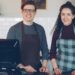 Referral program design people actually want photo 1 - STACKwebzine Small business owner discussing a referral program with a loyal customer