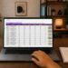 Revenue goals for the final quarter — photo 1 - STACKwebzine Small business owner reviewing revenue goals on a laptop spreadsheet
