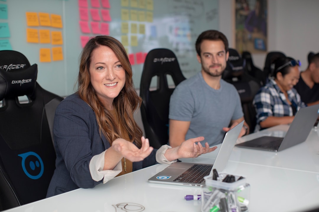 Small software team discussing automated tests during a sprint review