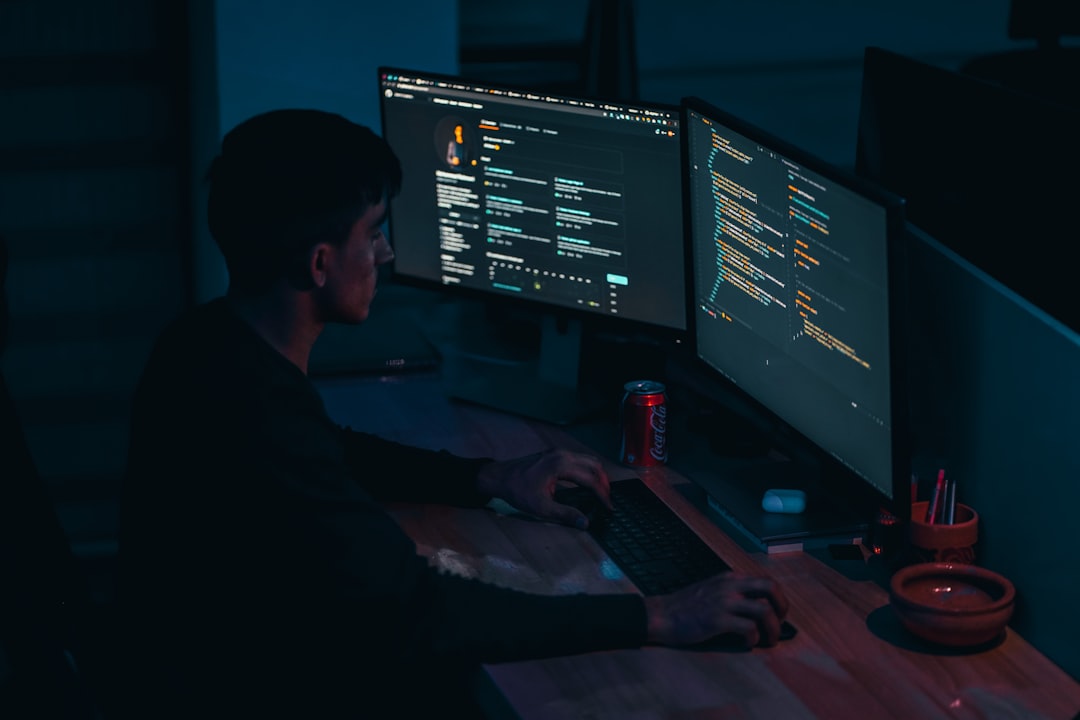 Programmer checking version control history on a screen