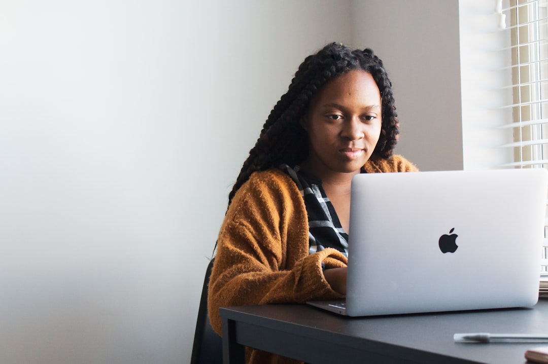 Small business owner setting update policy rules for staff