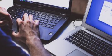 The hidden cost of skipping automated tests — photo 1 - STACKwebzine Developer running automated tests on a laptop before a release
