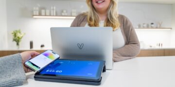Least privilege access for small teams photo 1 - STACKwebzine Small business owner reviewing least privilege access settings on a laptop