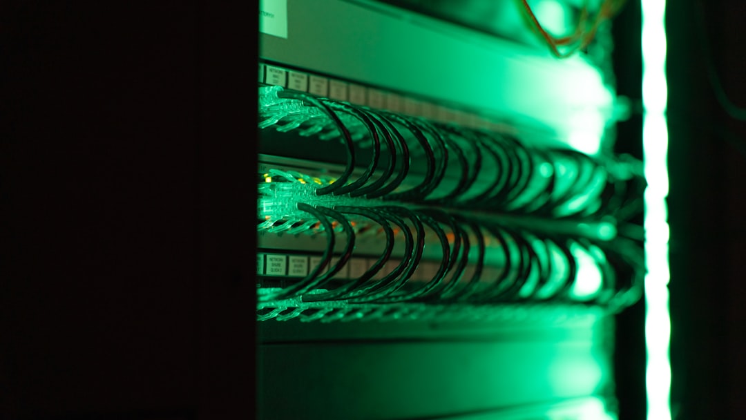 IT technician inspects servers supporting an edge computing setup