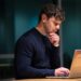 Prompt engineering that survives model updates — photo 1 - STACKwebzine Product manager checking prompt engineering results on a laptop