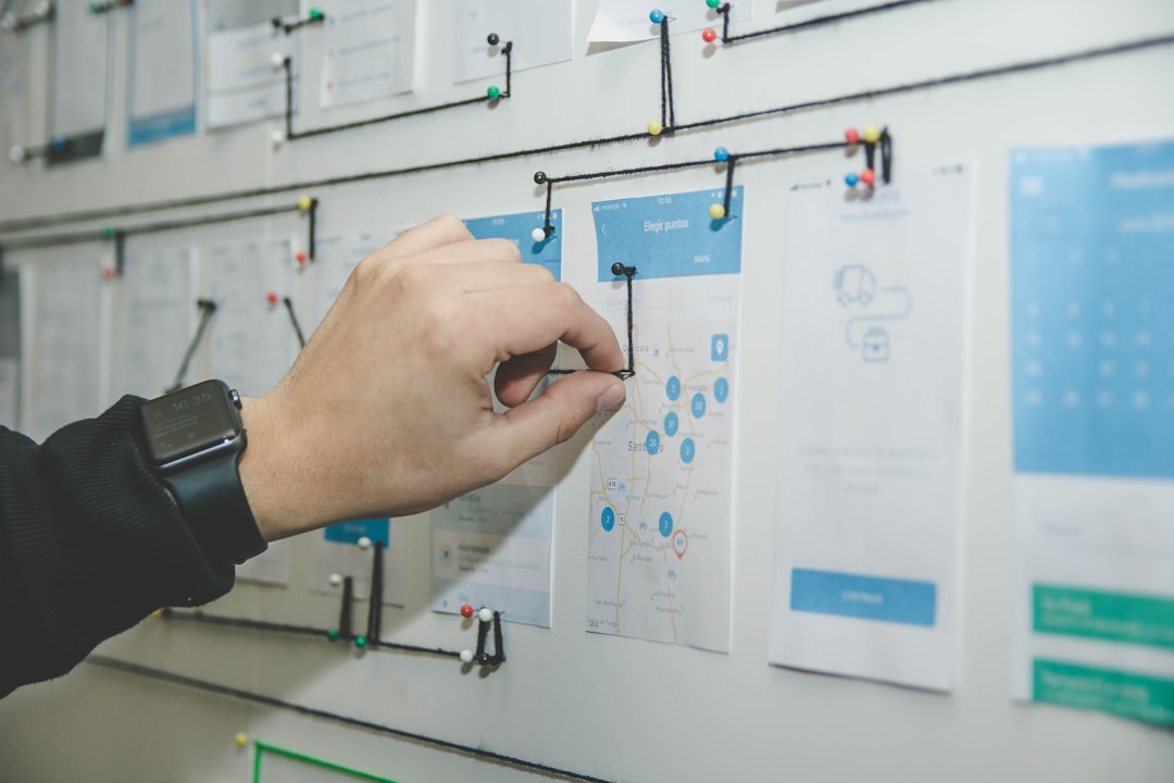 Product manager marking the code freeze date on a calendar