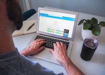 Site owner reviewing CDN performance on a laptop