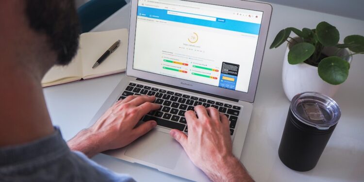 Site owner reviewing CDN performance on a laptop