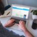 Site owner reviewing CDN performance on a laptop