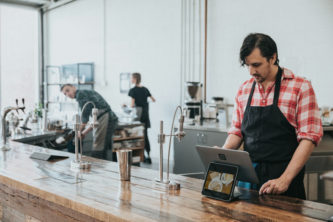 Online store owner reviewing load testing results on checkout
