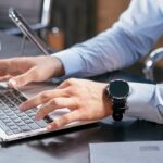 IT admin reviewing an update policy on a laptop screen