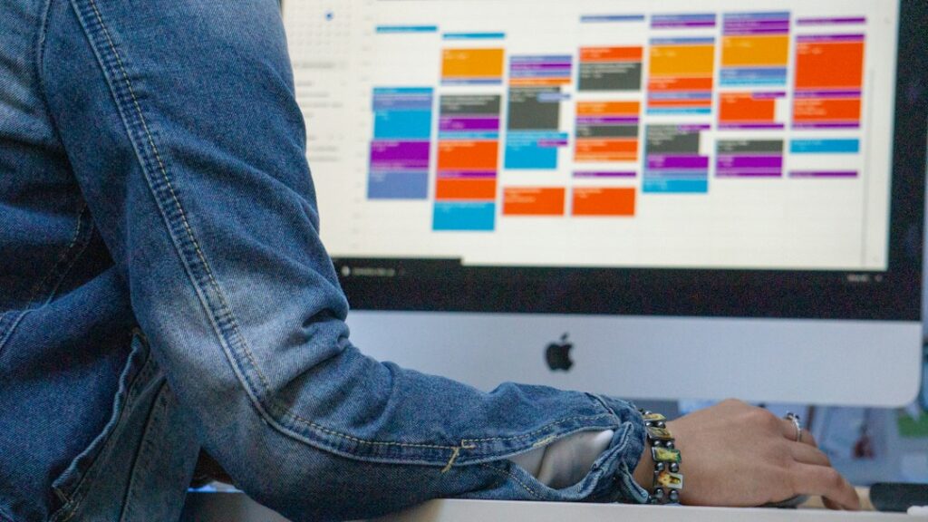 Developer marking a feature freeze date on a planning calendar